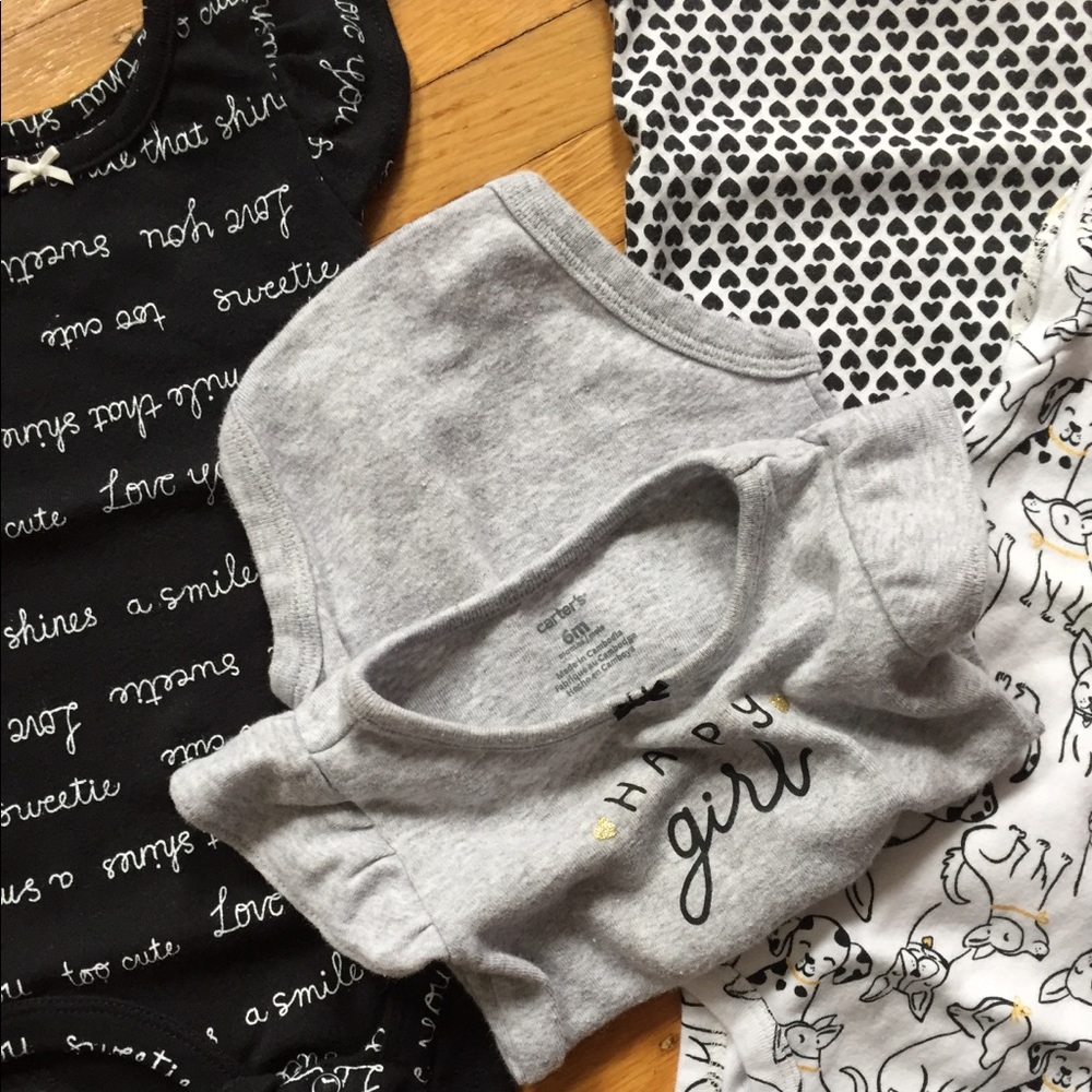 Carter’s set of 4 onesies, 6months.